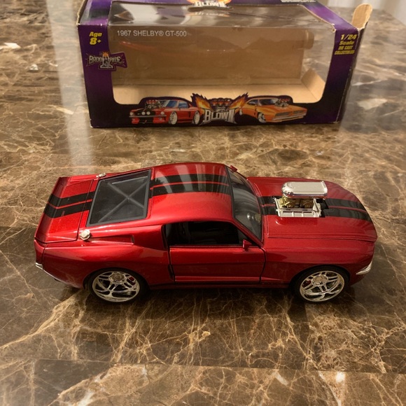 Badd Ride DieCast Collectibles
1967 SHELBY GT 500 1:24 Scale
Vintage - Picture 3 of 10